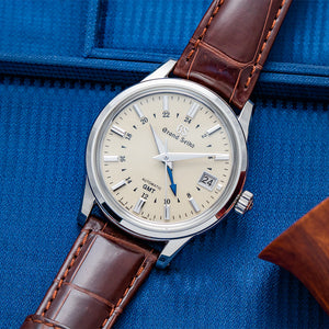 Grand Seiko Elegance Mechanical GMT 39.5mm - Ivory on Leather Strap SBGM221 - three-quarter view