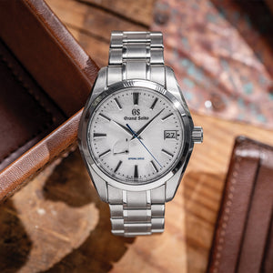 Grand Seiko "Snowflake" Heritage Spring Drive 41mm - White on Bracelet SBGA211 - three-quarter view